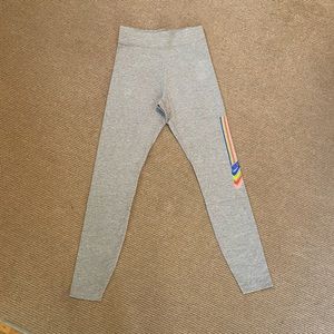 Nike gray leggings with rainbow stripes detail